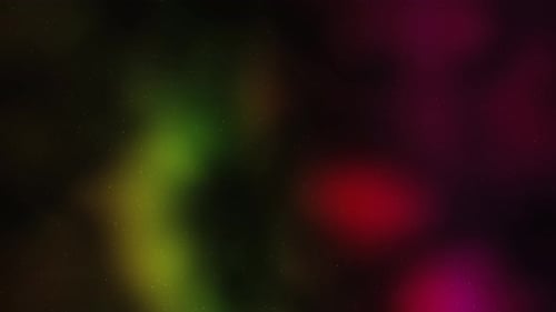 Glamour Collection: Multi colored out of focus background glowing in patches with tiny particles ema