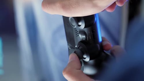 Video games. Close up of man hands playing video games