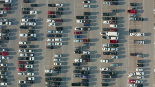 Parking lot full of cars. Vehicle, SUV, truck, auto lines and rows. Auto industry in America, USA.