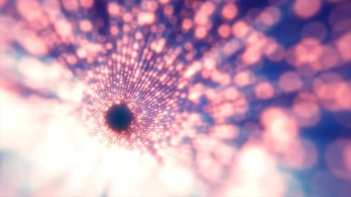 Tunnel of red energy particles blurred bokeh bright abstract background