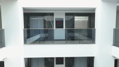 Atrium Elegance Aerial View of PremiumClass Homes Showcasing Exquisite Architecture Near the Ocean