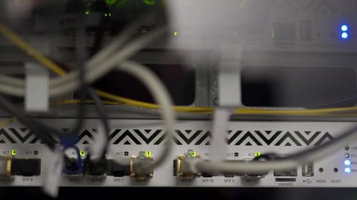 Network Equipment Blinking with Lights on Rack Optical Server and Router of the Data Center Server