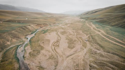 Aerial Shot Offroad Vechicle in the Mountains