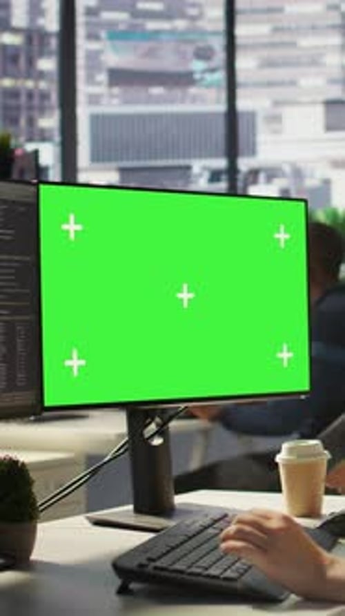Vertical Video Woman in Office Fixing Coding Issues Using Green Screen Computer