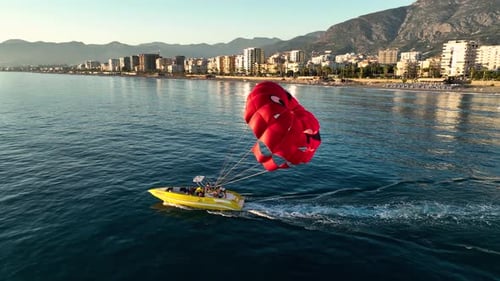 Parasailing Over the Mediterranean Sea at the Most Beautiful Sunset