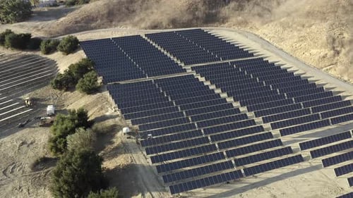 Aerial View of Solar Panel Farm in Countryside