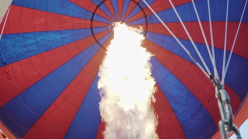 Flame Fills Colorful Hot Air Balloon Canopy