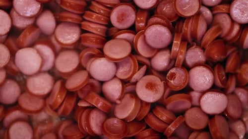 Sausage Cuts Frying on Pan Cut Sausages Frying in Pan in Hot Sizzling Oil Top View Shot of Roasting