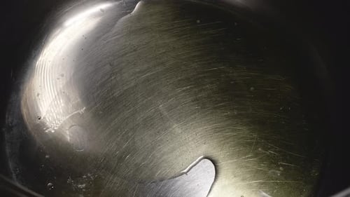 Close-up View of Chopped Onions Being Added to Saucepan With Olive Oil, Cooking Pasta Bolognese - St