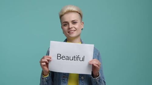 Closeup Shot of Caucasian Blondehaired Girl Looking Cheerful and Smiling