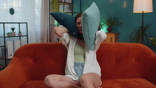 Repair Work at Neighbours Concept Irritated Woman at Home Cover Ears with Pillows Annoyed By Noise