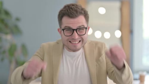 Man Reacts to Good News with Excitement