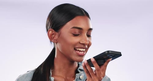 Phone call, loudspeaker or Indian woman in studio or white background for communication or chat