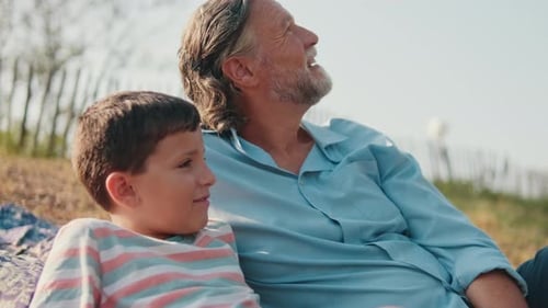 Grandfather and Grandson Enjoying a Day at the Park