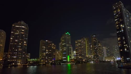 View From Above of Brightly Illuminated High Skyscraper Buildings in Downtown District of Miami