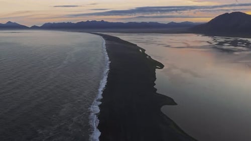 Aerial View of Black Sand Beach and Ocean at Sunset in Iceland