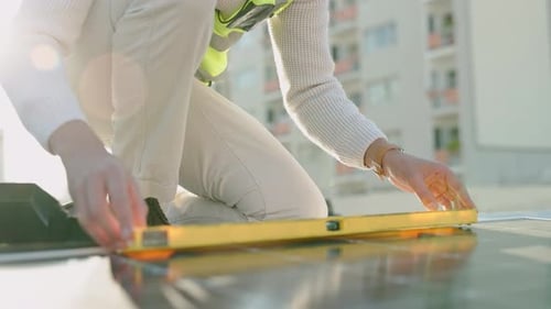 Solar panel photovoltaic, construction worker and building roof sun