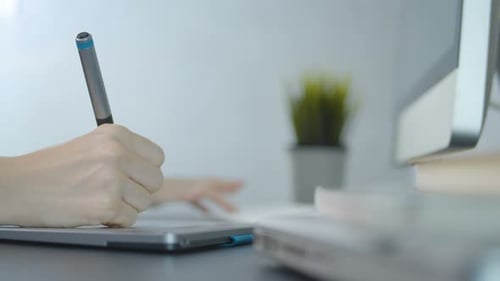 Stylus on Graphics Tablet in Minimalist Office