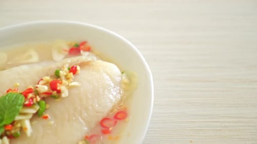 Close Up of Spicy Fish Dish with Mint