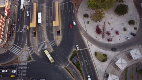 Traffic at Chacarita bus station in Buenos Aires city. Aerial top-down circling