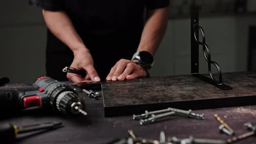 Female Carpenter Making Modern Furniture For Stylish Kitchen