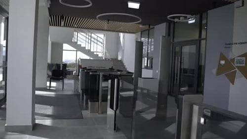 Glass Border and Turnstile in Hall of Corporate Building