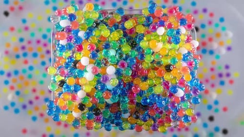 Colorful Water Beads in Translucent Container