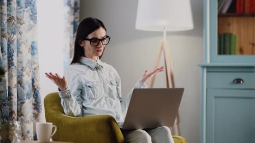 A Young Business Woman Working at Home Remote Job Employee Irritated Businesswoman Close Notebook