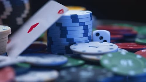 Casino Chips and Playing Cards in Motion
