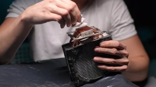 Cleaning Computer CPU Cooler with Cloth