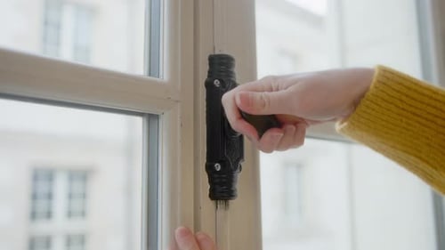 A Woman Is Opening A Vintage Style Window. Close Up Shot