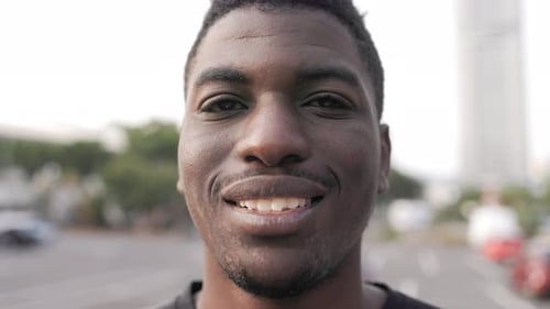 Smiling Young Man Close Up Portrait Outdoors