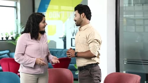 Video of man and woman shaking hands