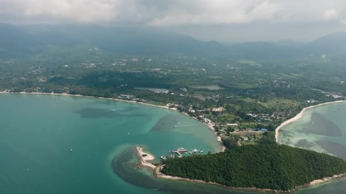 Aerial View of Lush Island and Turquoise Coastal Waters Lipa Noi Ko Samui Thailand
