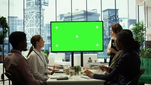 Diverse Team Meeting with Chroma Key Screen