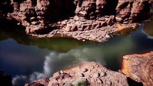 Aerial View of the Colorado River Winding Through Red Rock Formations