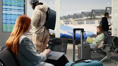 Independent Female Trader Checking Financial Data and Currency Exchange