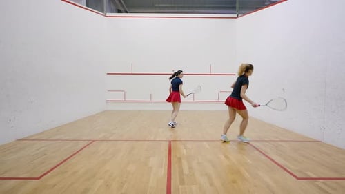 Female Squash Players Train Standing at Different Distances