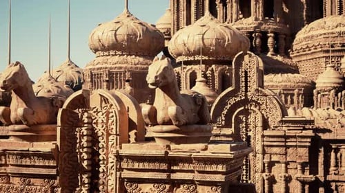 A Detailed Closeup of a Beautifully Carved Stone Wall on a Temple Building