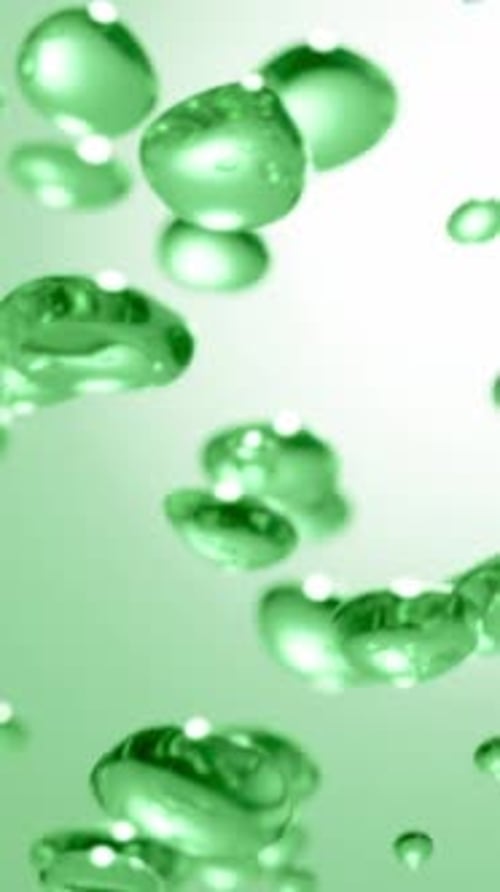 Floating Green Serum Liquid Droplets and Bubbles Aloe Vera or Green Tea Natural Extracts Skincare
