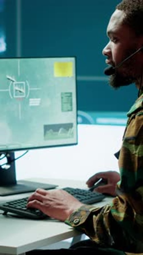 Person working at computer wearing headset