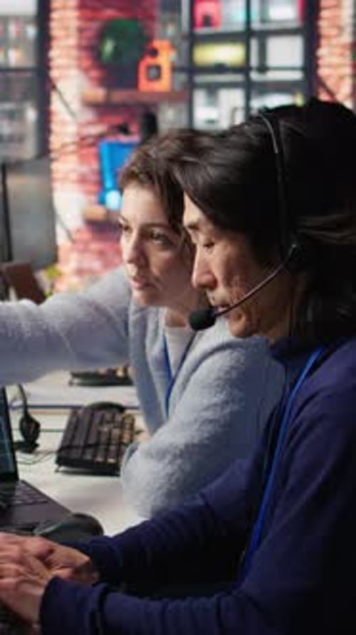 Vertical Video Call Center Manager Supervising Work Done By Agent Helping Customers