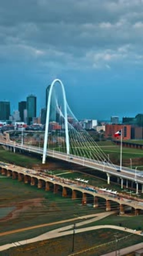 Aerial view of Dallas showcasing the skyline and a modern bridge