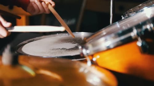 Repetition Girl Playing Drums in the Studio Only Hands Shown