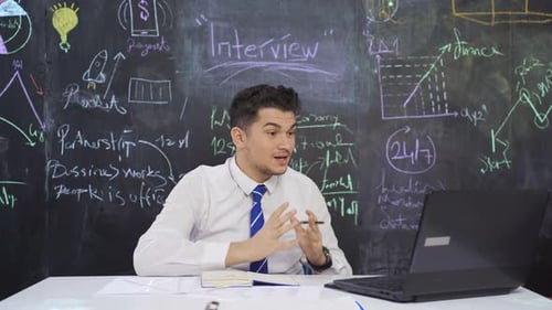 Man Talking in Business Meeting Online