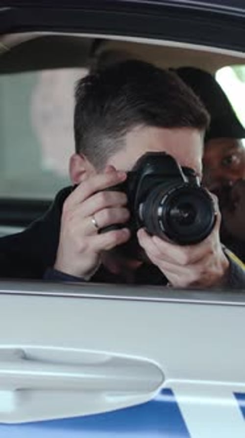 Two Men on a Road Trip Capture Moments with a Camera Enjoying Scenery