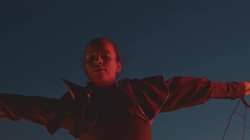 Woman Performing Amazing Fire Dancing at Night