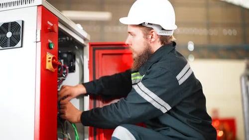 Industrial engineers working inside automation and robotics factory - New industry tech