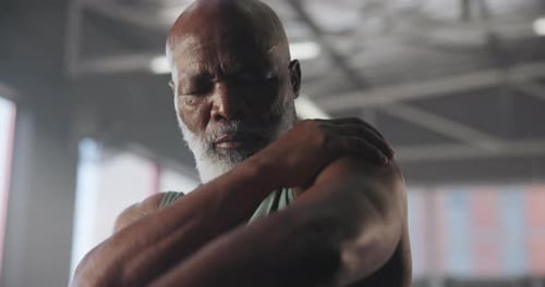 Exercise, strain and shoulder pain with black man in gym for accident, cramp or muscle fatigue