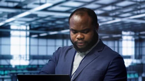 Software Developer in Data Center Runs System Diagnostic Tests on Notebook